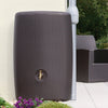 Image of Wicker outdoor minitank with a tap on a patio setting.