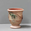 Image of Vintage ceramic vase with green accents on a gray background