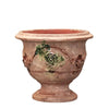 Image of Terracotta pot with decorative elements on a white background