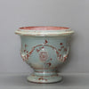 Image of Ceramic vase with red floral patterns on a white background