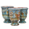 Image of Three ceramic pots with decorative patterns on a white background