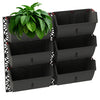 Image of Wall-mounted gro wall slim line with a green plant on a white background