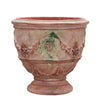 Image of Terracotta pot with decorative patterns on a white background