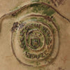 Image of Decorative motiff close up with 'Le Chene Vert Anduze' branding and design.