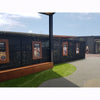 Image of facade panels in restaurant with signage installed on them.