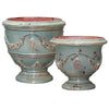 Image of Two decorative urns with a light blue and red pattern on a white background