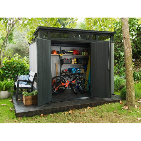 Keter Artisan 9 x 7 Garden Shed With Tools In The Garden