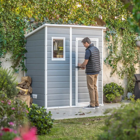 Keter Manor Pent 6x4 Garden Shed With Person Locking The Door