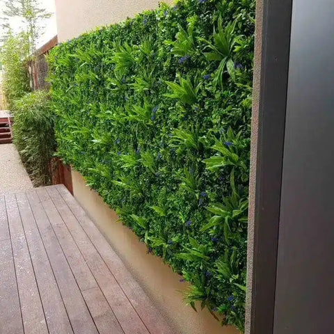Artificial Lavandula Vertical Garden Plant Wall Screening Panels installed on an exterior wall by a wooden deck