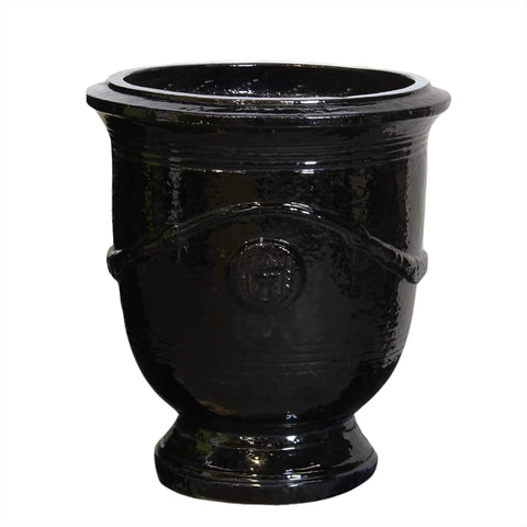 Black decorative urn on a white background