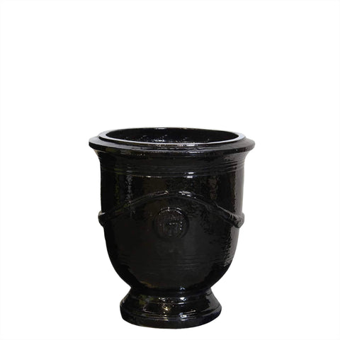 Black small decorative urn on a white background