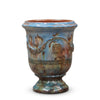 Image of Ceramic vase with blue and brown glaze on a white background