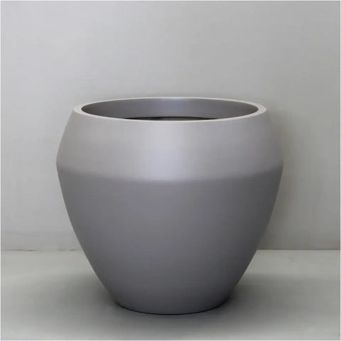 Sierra Lightweight Calix Pot Planter against wall