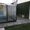 Image of Artificial Premium Natural Buxus 1m x 1m Hedge Panel UV Stabilised Installed Near Swimming Pool